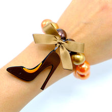 Load image into Gallery viewer, BRACCIALE TACCO 12 MARRONE ARANCIO - malikaforhappypeople
